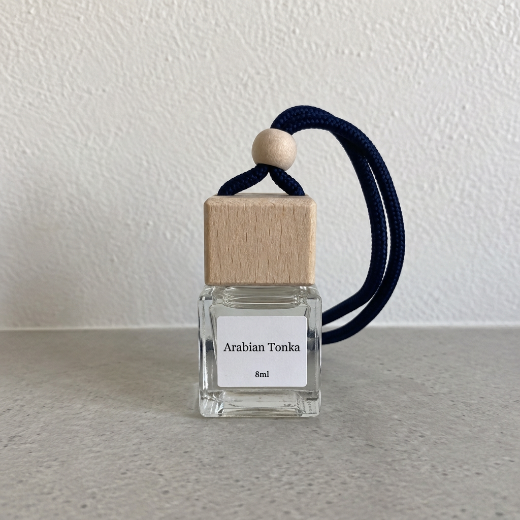 Arabian Tonka 8 ml clear-liquid car diffuser bottle with labelled glass and navy cord