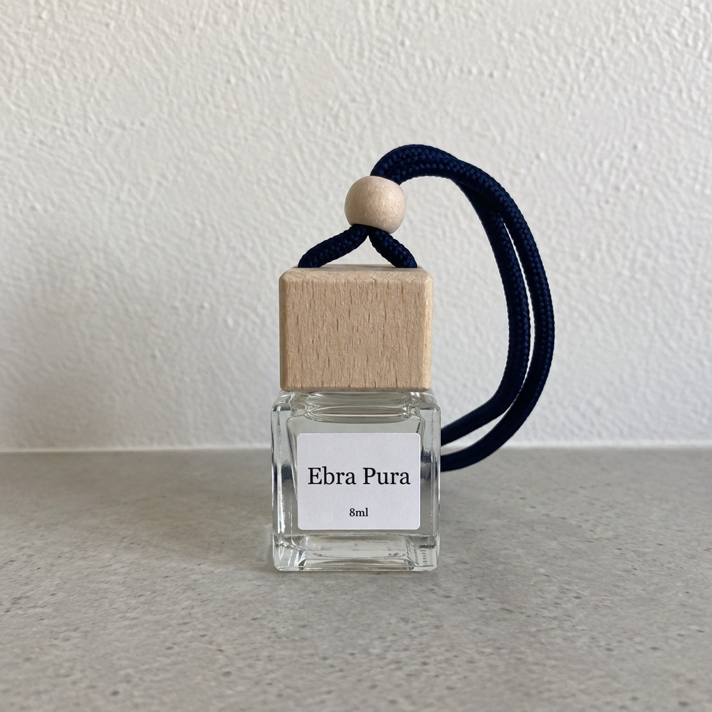 Ebra Pura 8 ml clear-liquid car diffuser bottle with labelled glass and navy cord